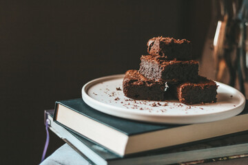 Side view of chocolate brownies on a plate