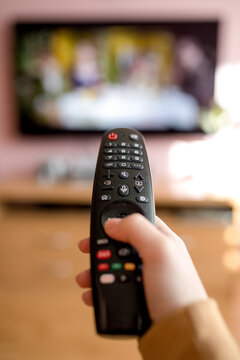 tv remote control in hand