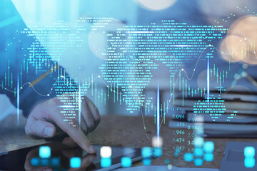 Businessman finger touch tablet, world map and graph changes