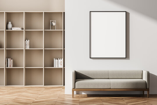 Beige living room interior with seat and bookshelf, mock up