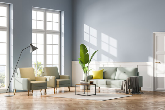Blue and white living room interior with sofa and armchairs near window, mockup