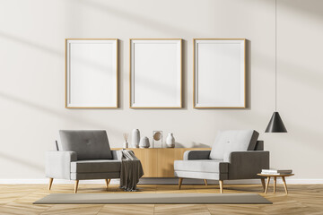 Beige living room interior with armchairs and drawer, mockup posters