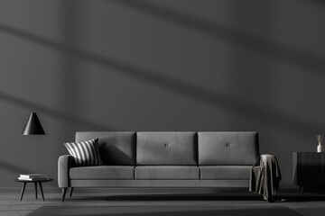 Grey sofa in dark living room interior with coffee table, mockup