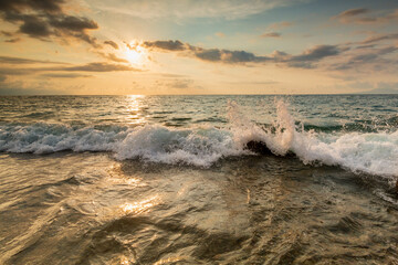 Fototapeta na wymiar Sunset Ocean Wave