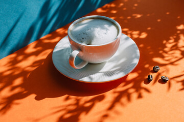 Breakfast with a Cup of coffee with cream and cakes