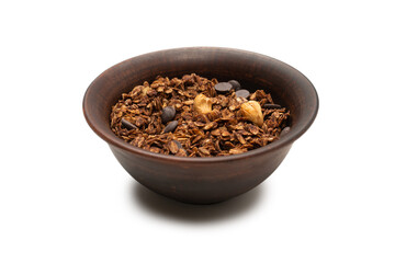 Chocolate granola cereal with nuts in a bowl background.