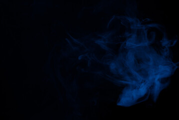 Obraz premium Blue and pink steam on a black background.