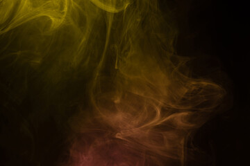 Yellow and pink steam on a black background.