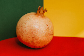 pomegranate on a colored background 