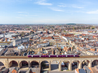 Mansfield Town England UK Cityscape aerial view of town with big long stone railway viaduct arches...