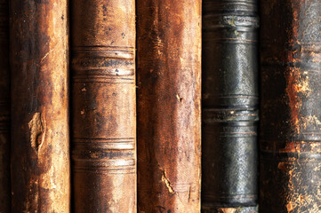 Stack of old books on a library shelf. Vintage books