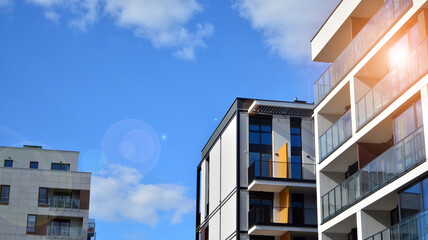 Multistoried modern, new and stylish living block of flats. Newly built apartment building.