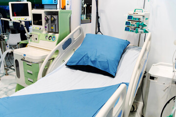 Medical bed with life support equipment and sensors. A fragment of a hospital ward with a place for a patient. Close-up