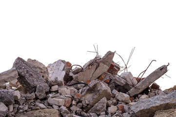 Concrete fragments of a destroyed building isolated on a white background.
