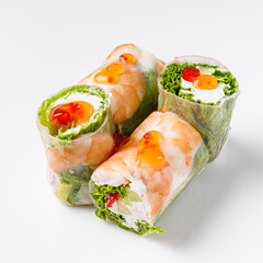 appetizing spring rolls with sea food and philadelphia cheese on a white background