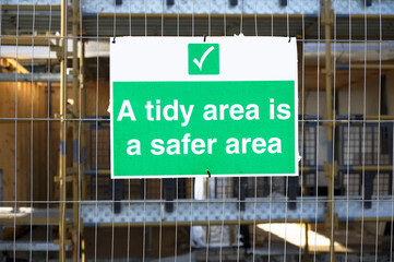 A tidy area is a safe area construction. site safety sign