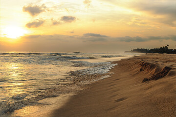 Fototapeta na wymiar Ocean shore at sunset. Sri Lanka