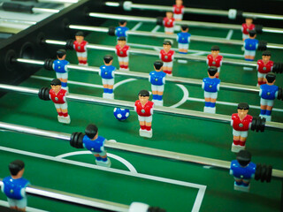Close-up view of table football. Sport teame football players