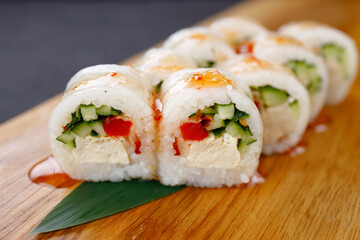 Sushi rolls with vegetables and tofu, vegan food