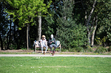couple resting on a bench