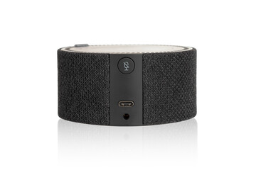 Obraz premium Smart speaker on a white background. The speaker for a smart home close-up.