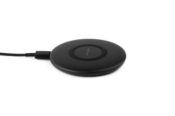 Wireless charging for a smartphone on a white background. Fast wireless charger close-up.