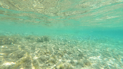Fototapeta na wymiar Underwater mediterranean paradise beach with emerald - turquoise sea