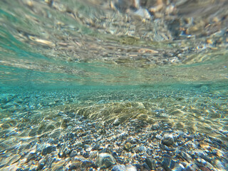 Underwater photo of tropical exotic island sea bed in calm emerald beach