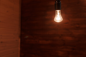 Indoor light is on. Light bulb.