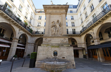 The fountain of Mars located In rue Saint-Dominique, on a little square, Paris, France.