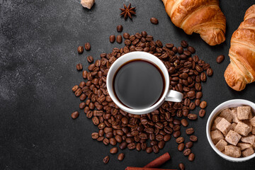 Fresh crisp delicious French croissant with a cup of fragrant coffee