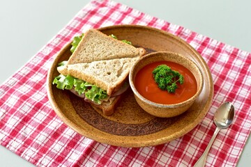 Tasty comfort meal soup and sandwich for cool blustery spring day. Food background, photo concept, healthy lifestyle eating. 