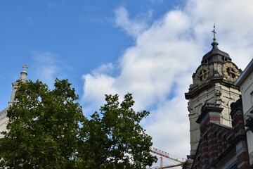 Fototapeta na wymiar Clock tower of church and trees