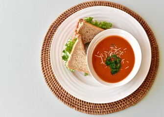 Tasty comfort meal soup and sandwich for cool blustery spring day. Food background, photo concept, healthy lifestyle eating. 