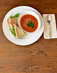 Tasty comfort meal soup and sandwich for cool blustery spring day. Food background, photo concept, healthy lifestyle eating. 