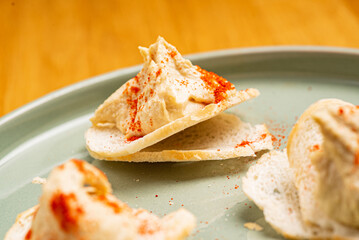 tapas with hummes on the plate