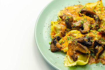 Fresh egg pasta with ricotta cheese and porcini mushrooms paste filling, delicious tortelloni