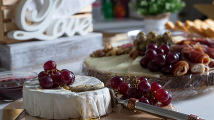 Appetizer party table cheese and fruit