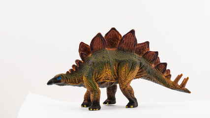 toy dinosaur on white background