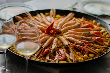 Seafood paella with delicious white wine