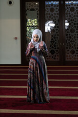 Fototapeta na wymiar Woman Prayer at Mosque