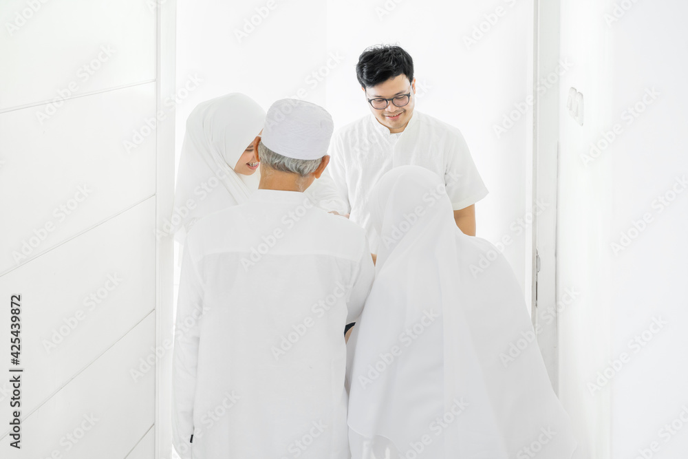 Poster happy family visiting grandparents at eid mubarak