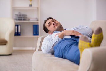 Young businessman employee waiting for business meeting