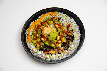 Japanese sushi on a plate rice fish red