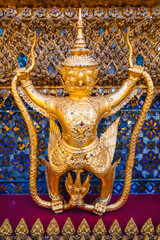 Details on the base of the Wat Phra Kaew's main hall - a sacred temple whic is a part of the Thai grand palace, where it houses an ancient Emerald Buddha