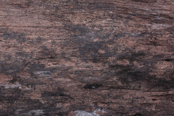 Dark brown dirty old wooden plank texture background.