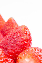 Red strawberries on white background.