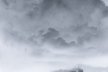 Cloud is an aerosol consisting of a visible mass of minute liquid droplets, frozen crystals or other particles suspended in the atmosphere of a planetary body