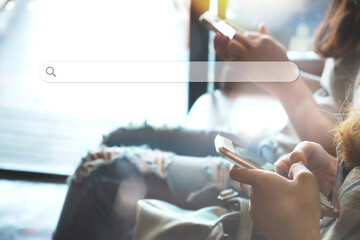 Searching information data on internet networking concept. Women use smartphone to search the...