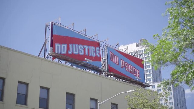 No Justice No Peace Billboards on Building During Black Lives Matter Protest in New York USA, Wide View